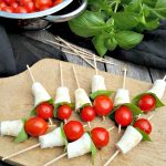 Friends or family on the way over and need a super easy, healthy and tasty appetizer? Whip up these super simple Caprese salad skewers! So delightful!