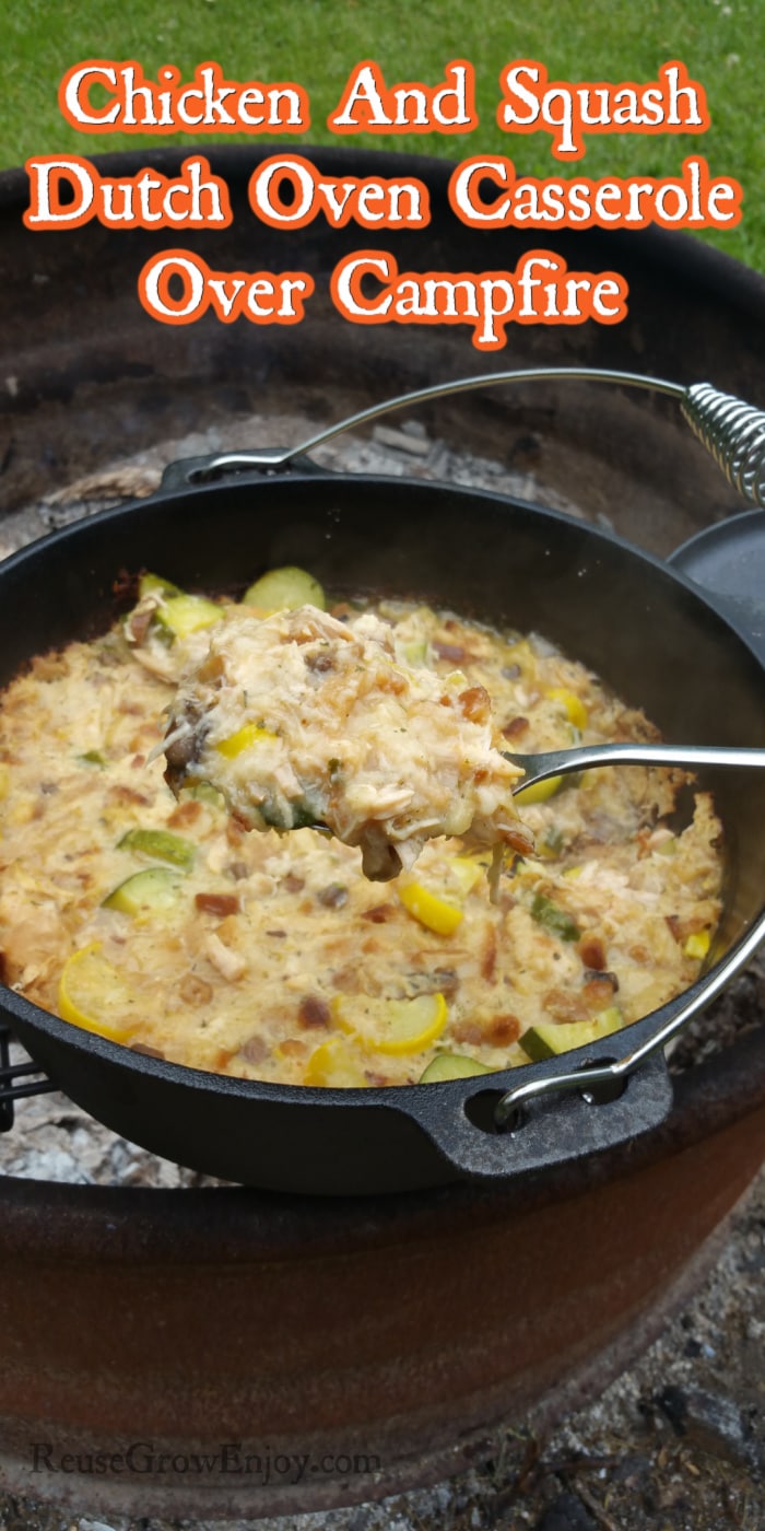 Chicken And Squash Dutch Oven Casserole Over Campfire with text overly at the top.