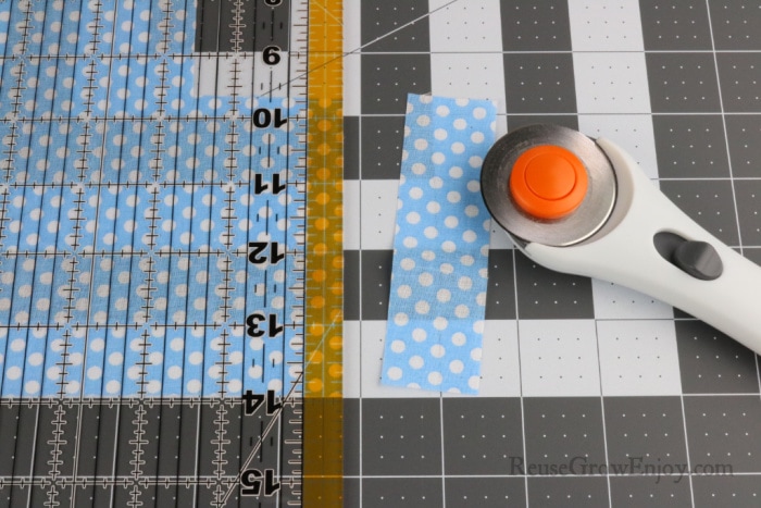 Cutting fabric on cutting mat