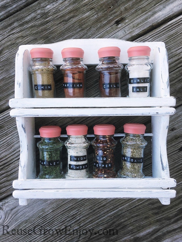 Check out this super easy DIY Spice Rack Makeover! Give that old spice rack a whole new look!