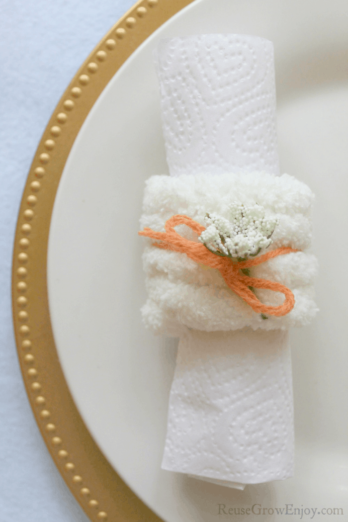 Finished country napkin rings on a plate.