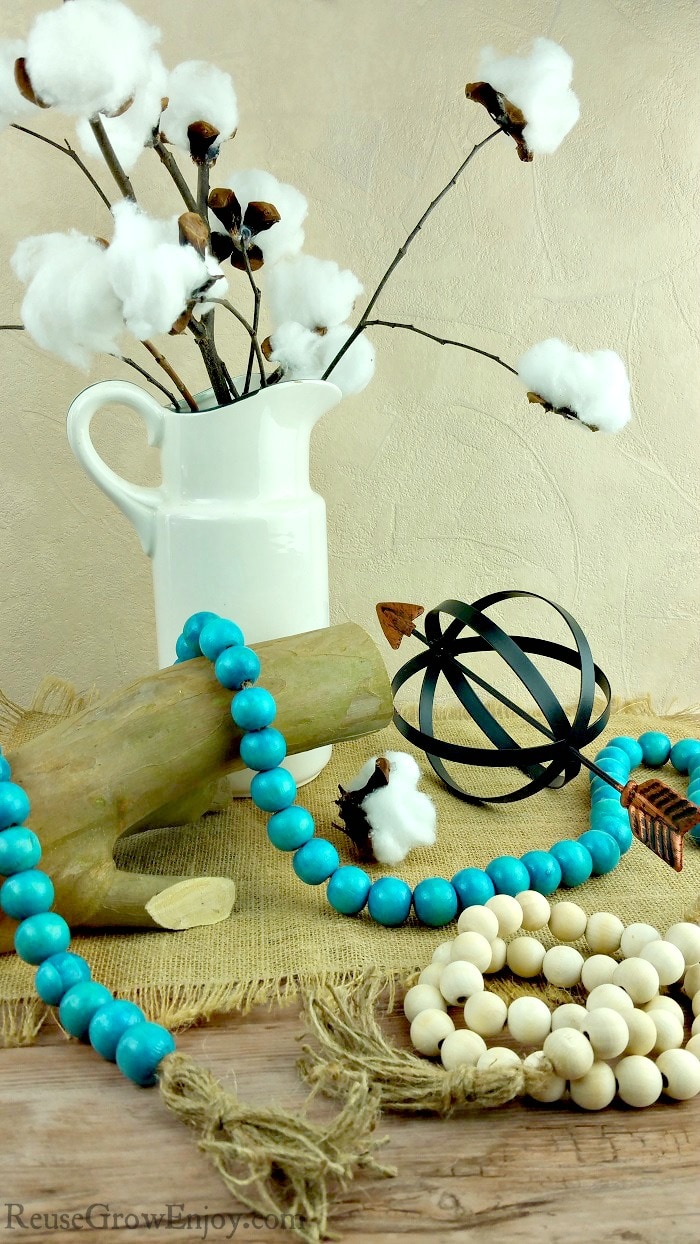 Do you like the look of farmhouse decor? I do too! However it can be pricey to buy sometimes. Check out this Farmhouse Decor - DIY Wood Farmhouse Beads!