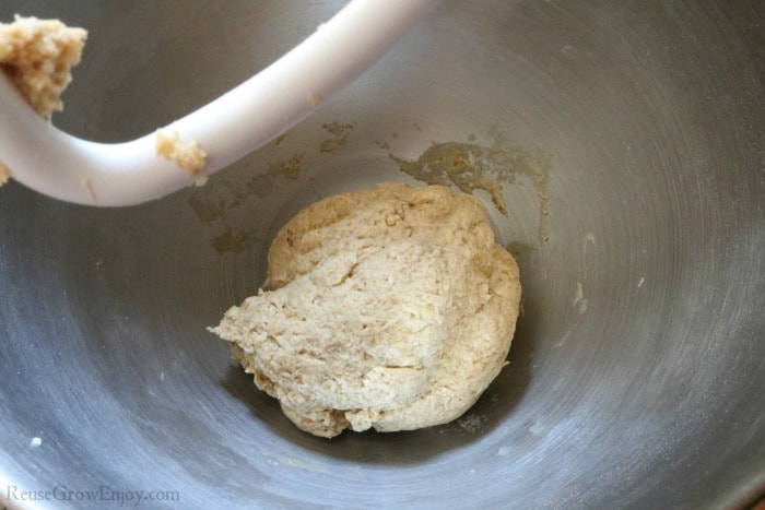 Dough formed into ball in mixer
