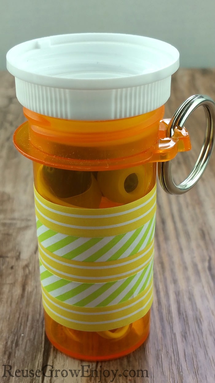 Check out this cool earbud case made from an upcycled pill bottle!