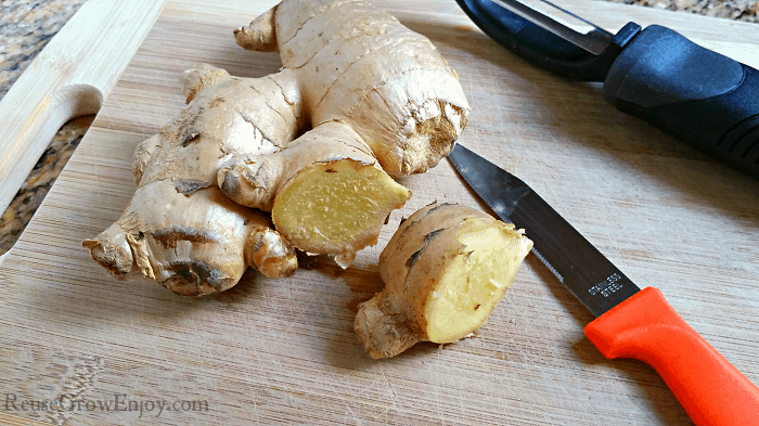 Fresh ginger being cut