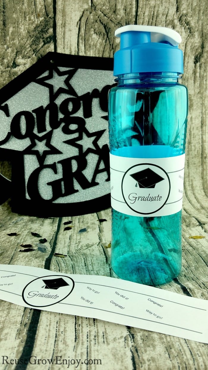 Having a graduation party? If you are looking for ways to carry the graduation theme through the party and are on a budget, be sure to check out this free Printable Graduation Water Bottle Label!