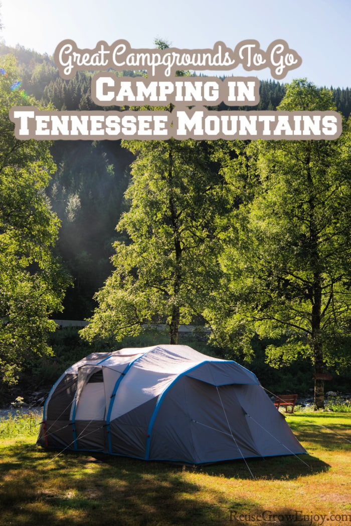 Camping in Tennessee Mountains with a Tent by edge if water with trees and mountains in background