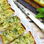 Love fresh garlic bread? Check out this recipe for homemade garlic bread with parmesan herb butter. It is so easy to make and sure to be a family favorite!
