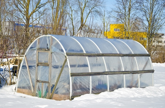 Hoop Greenhouse with snow around it