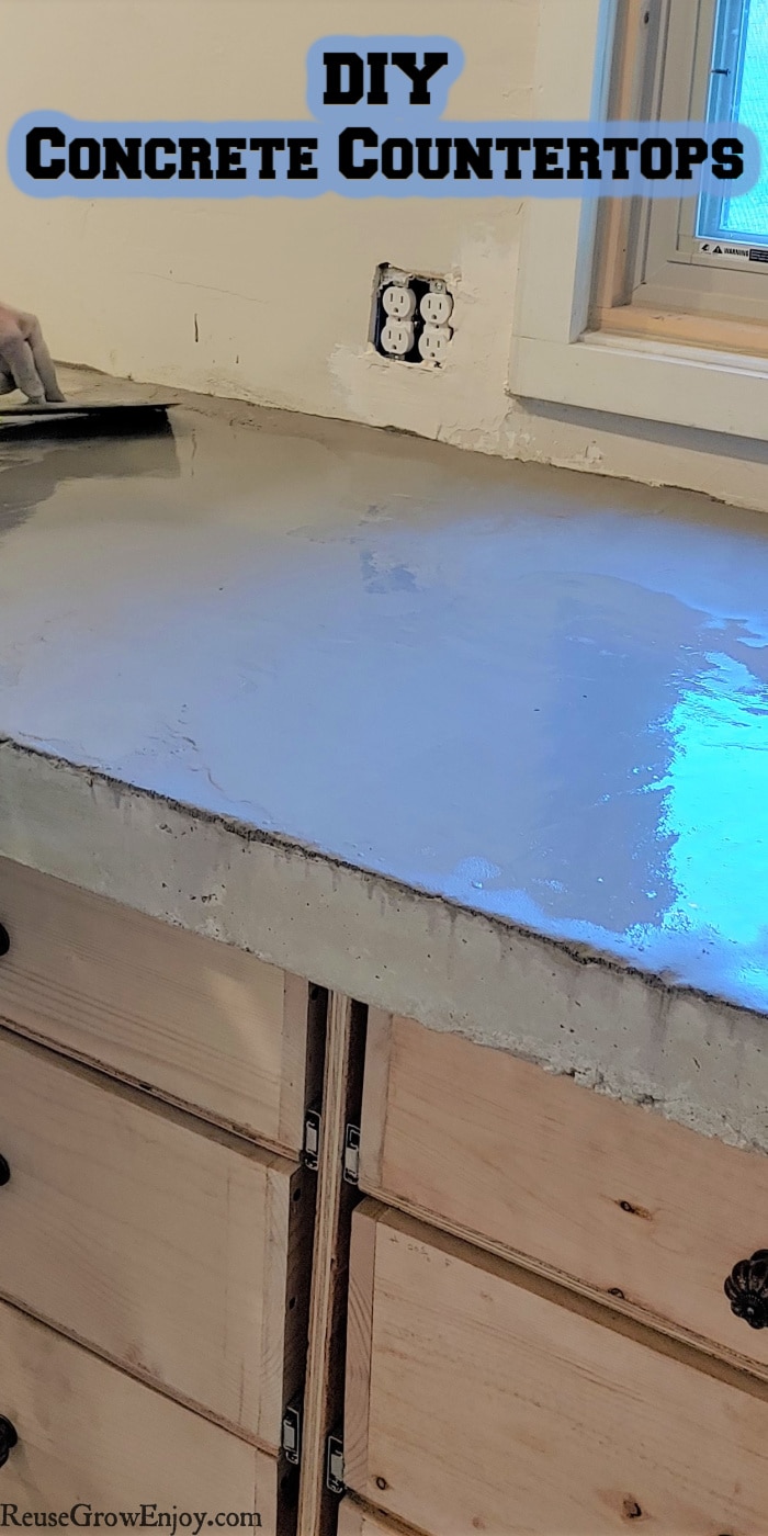 Concrete counter being made with text overlay at top that says DIY Concrete Countertops