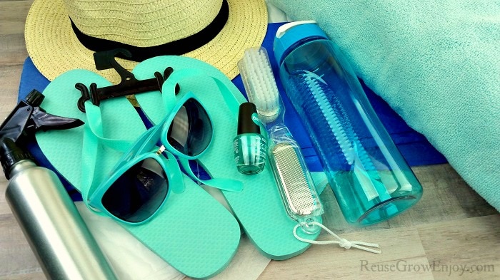 Items To Include In Mom Gift Summer Tote, Hat, Sunglasses, Flip flops and so on.