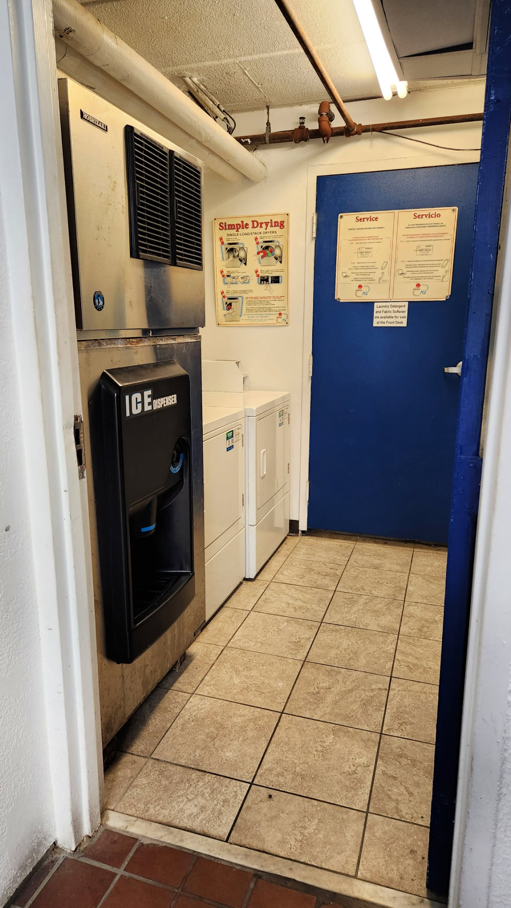 View of washer dryer and ice machine 