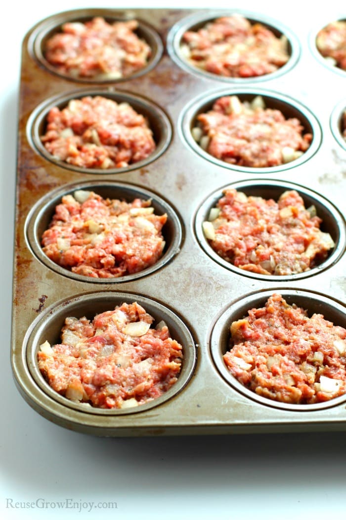 Meatloaf mix in muffin tins