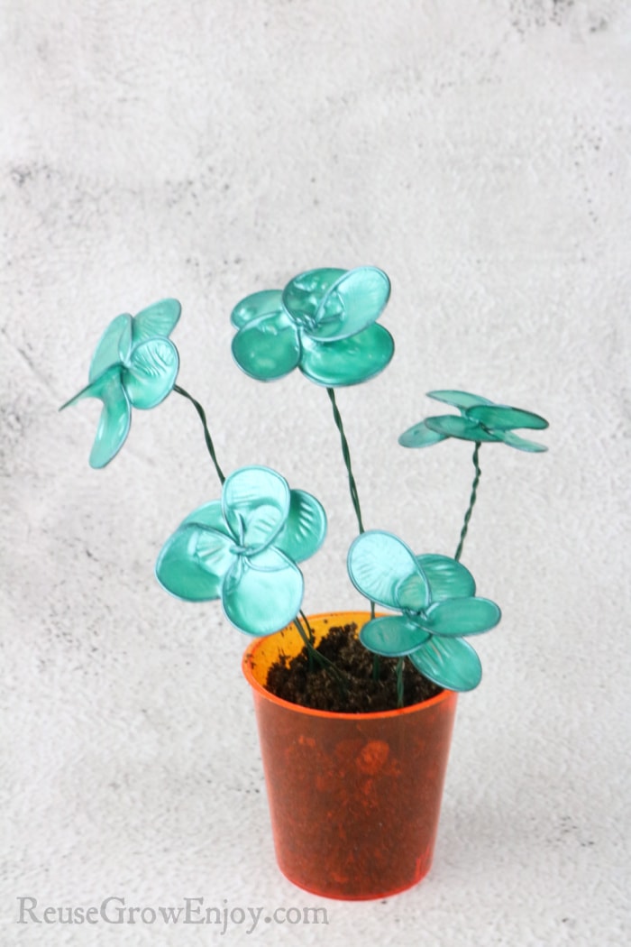 Nail Polish Wire Flowers in small cup of dirt