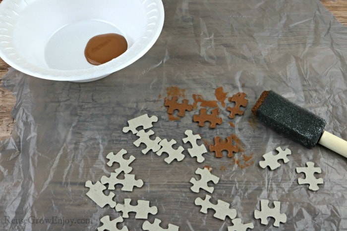 Paint puzzle pieces brown