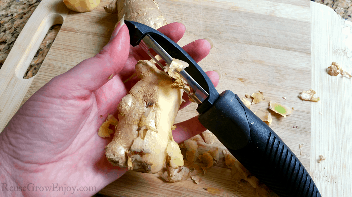 Fresh ginger being peeled