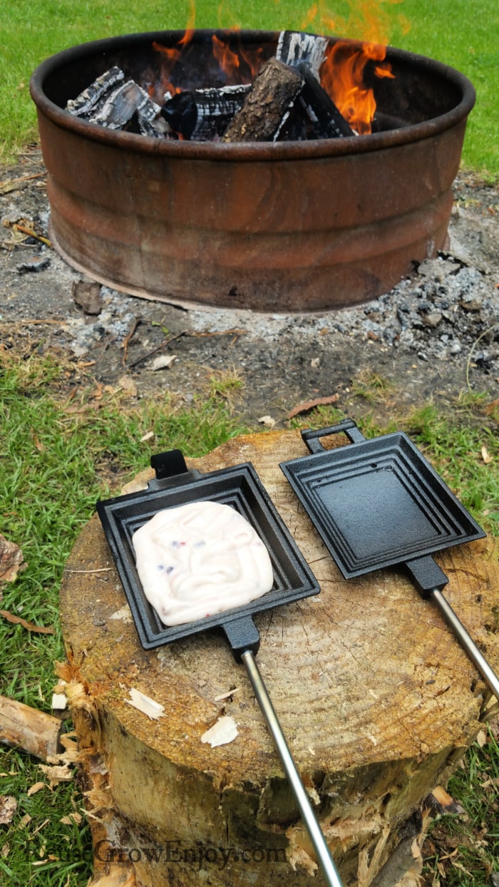 Pour batter into pie iron