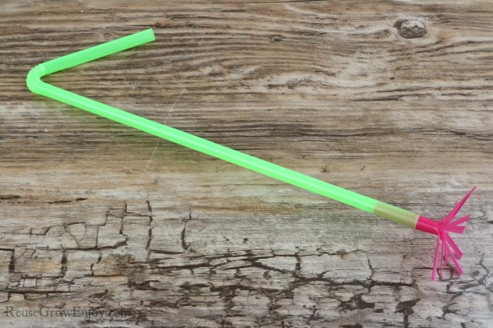 Put straw flower into longer straw