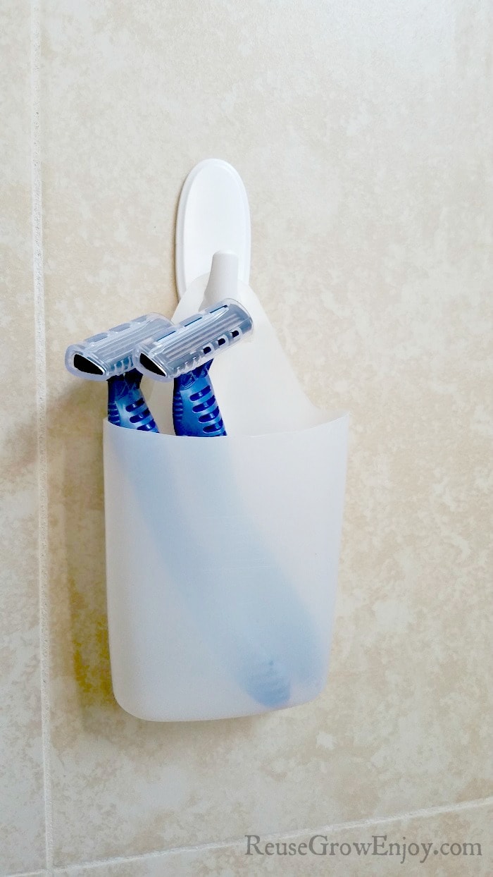 Don' toss out that empty shampoo bottle! You can use it or other empty plastic bottles to make handy holders and vases to use around the house!