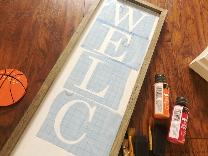 Stick letters to board