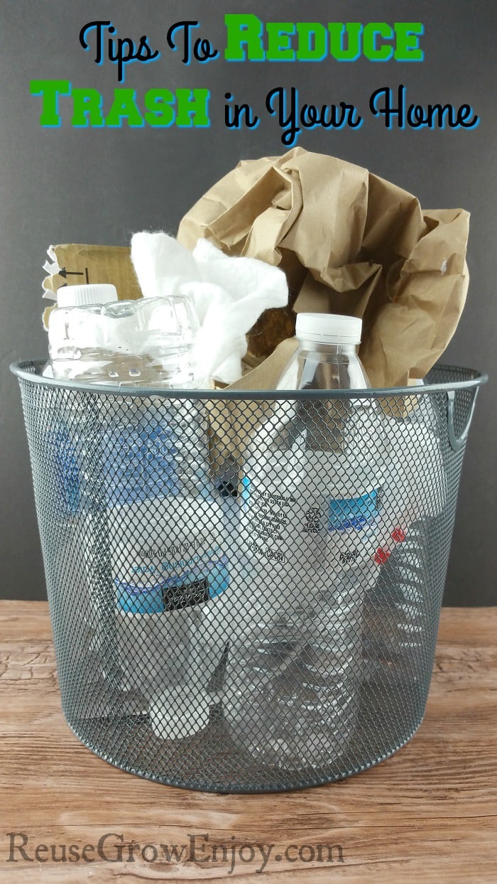 Small wastebasket full for things like plastic bottles and bags and other trash