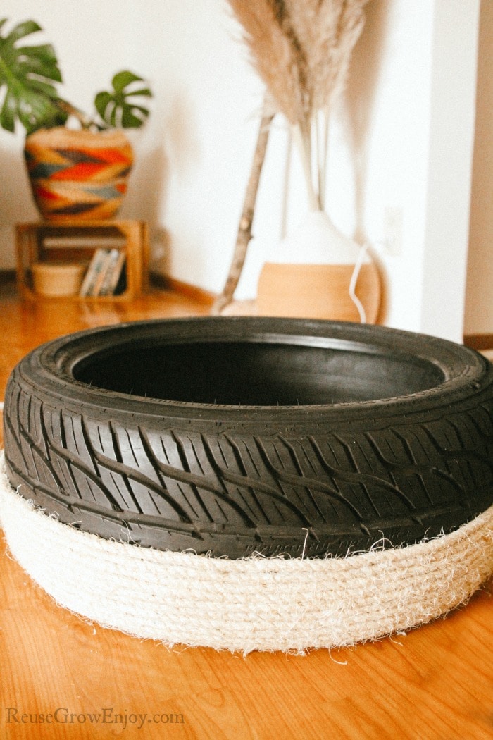 Tire half covered in rope