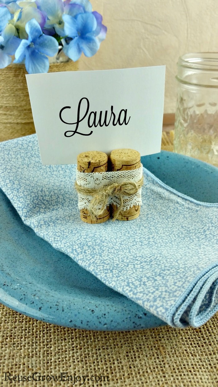 If you have a wedding or party coming up that you need place holders for, this is an easy and super cute upcycled cork place holders craft. They only take a few minutes to make!