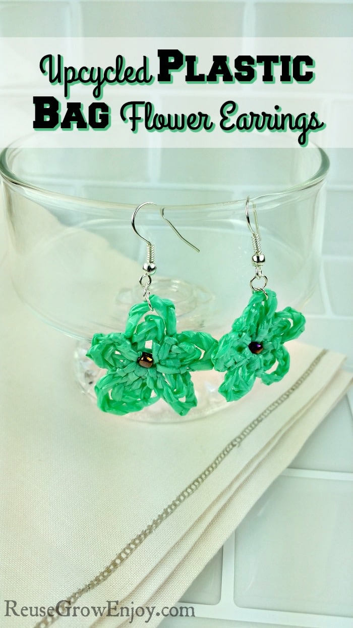 Are someone that likes to do crafts? If that sounds like you, I have a fun and super cute project for you. You can make these Upcycled Plastic Bag Flower Earrings!