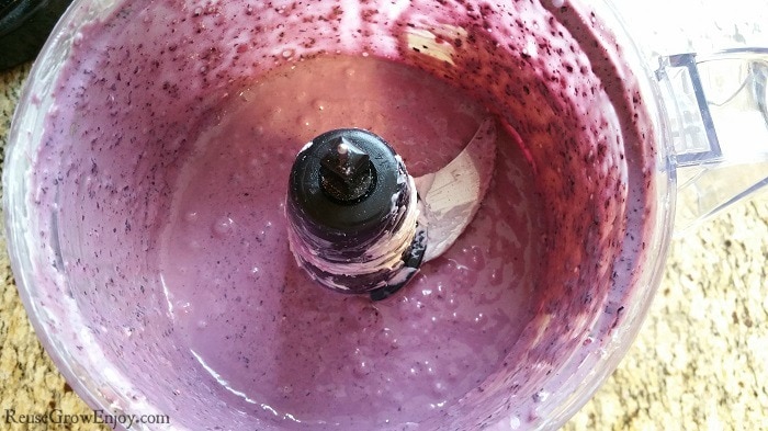 blueberry cheesecake mixture being mixed.