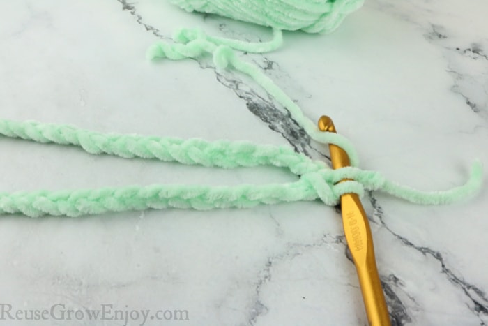 crochet hook joining two ends of chain