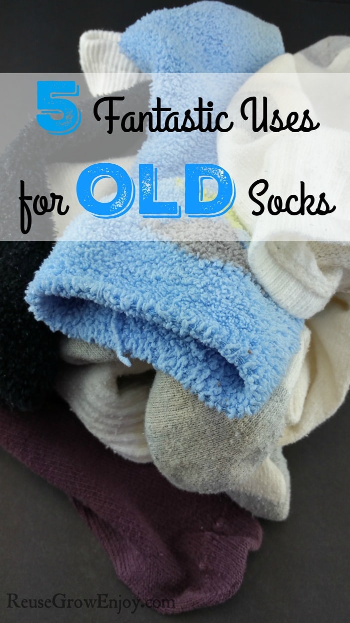 Pile of miss matched socks with a text overlay at the top that says Fantastic Uses for Old Socks